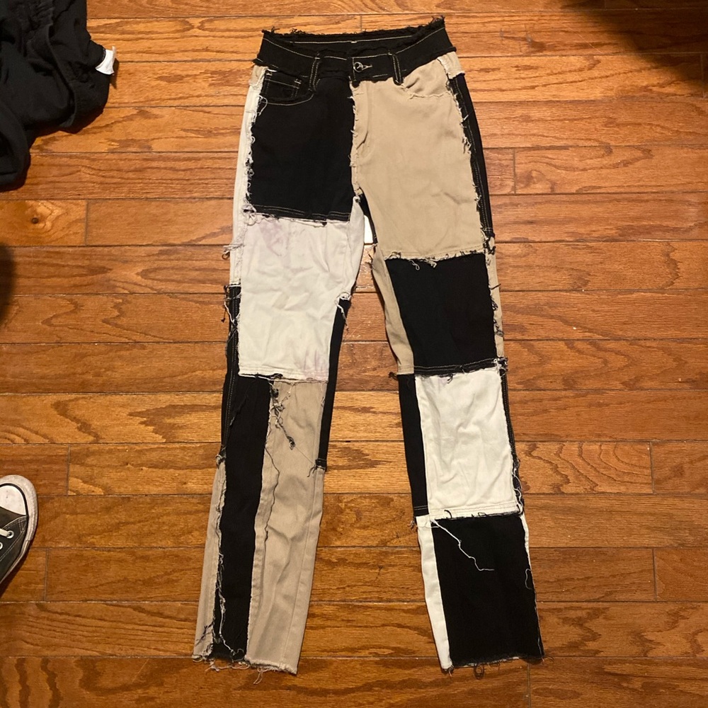 tan black and white patched high waisted jeans